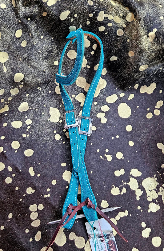 Bright turquoise one ear